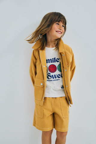6 year old boy wearing Cosmos Bermuda Shorts Honey Gold from The New Society rented on Bundle to Bundle