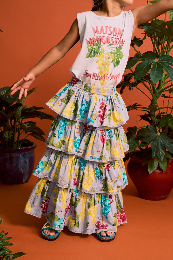 6 year old wearing Ruffles Uvas Skirt from Maison Mangostand rented from a kids clothing rental subscription called bundle to bundle 