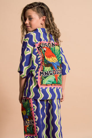 Back of 6 year old boy wearing Loros Wavy Shirt Blue from Maison Mangostan rented from Bundle to Bundle
