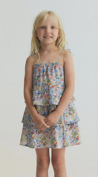 7 year old girl wearing the new society's Verbena Dress Verbena Print rented from a kids clothing rental subscription - Bundle to Bundle