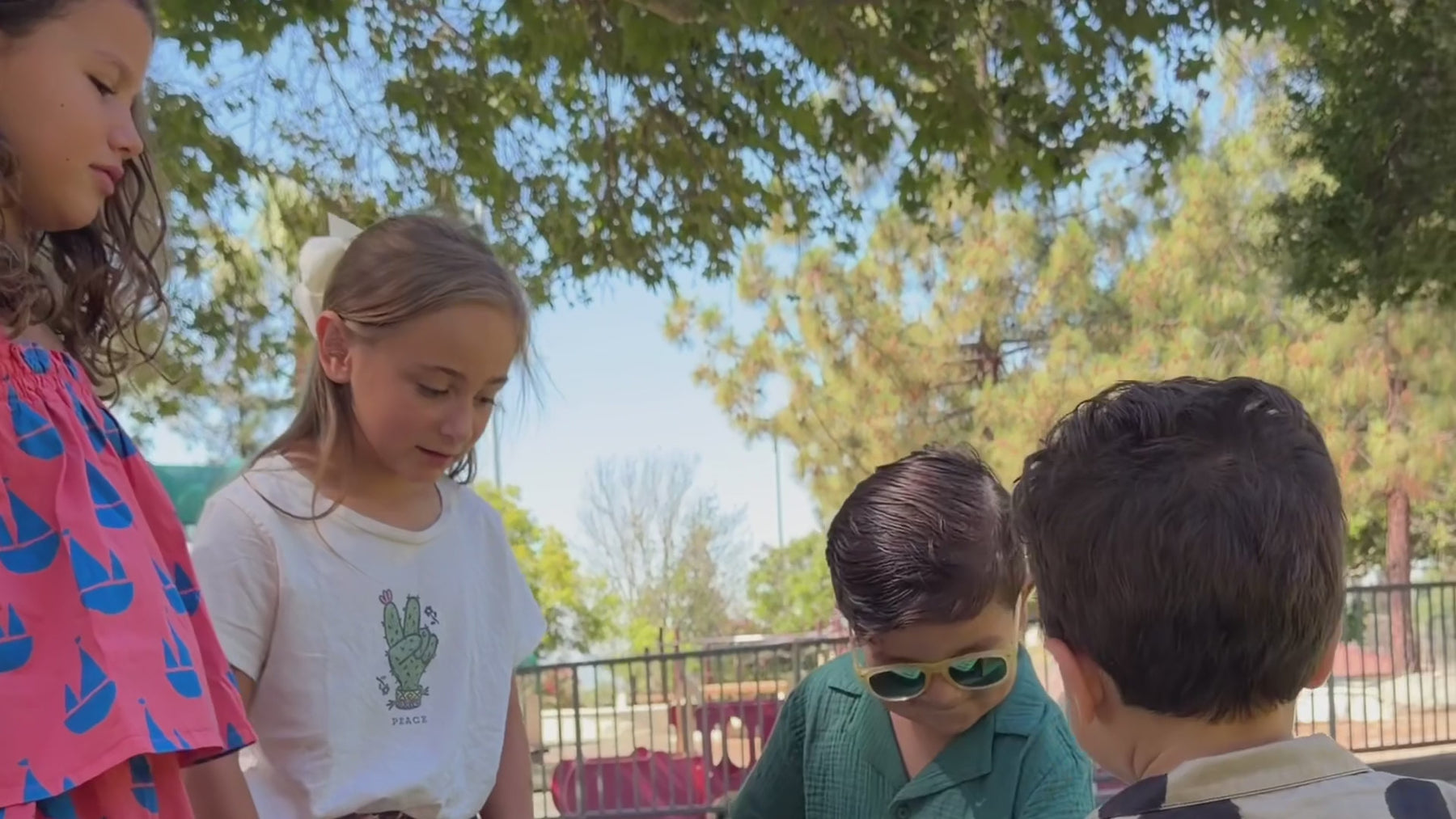 Kids wearing Bundle to Bundle rentals at the park and zoo
